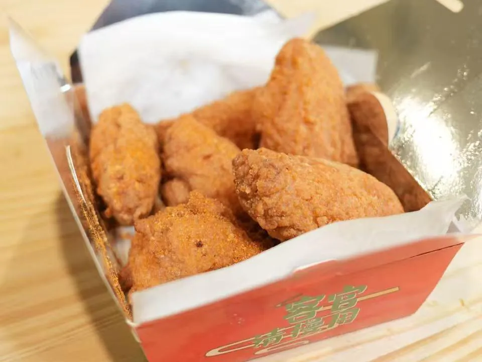 Golden crispy fried chicken wings at Insomnia Kitchen, a Chinese Restaurant in Houston