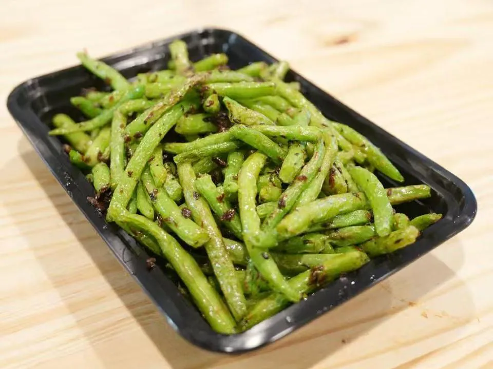 Stir-fried green beans with garlic and chili at Insomnia Kitchen, a Chinese Restaurant in Houston