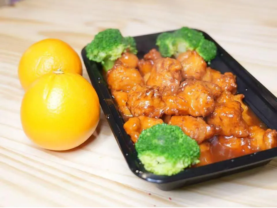 Crispy chicken in sweet and tangy orange sauce at Insomnia Kitchen, a Chinese Restaurant in Houston