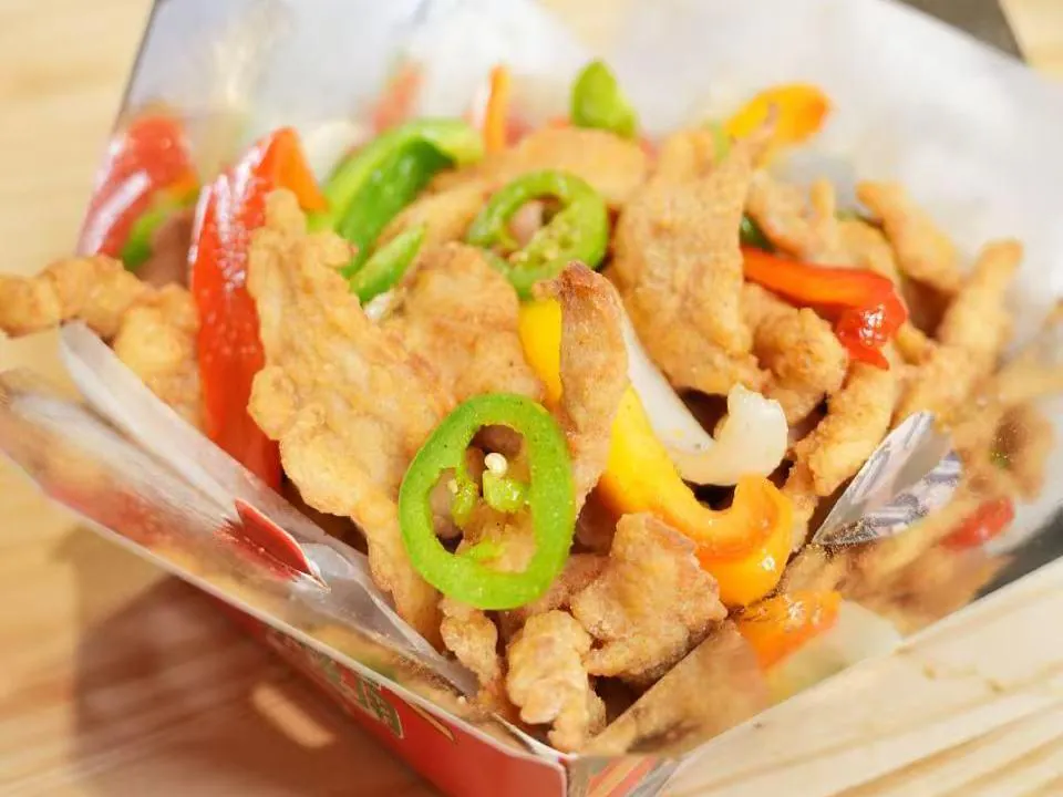 Crispy chicken with salt and pepper seasoning at Insomnia Kitchen, a Chinese Restaurant in Houston